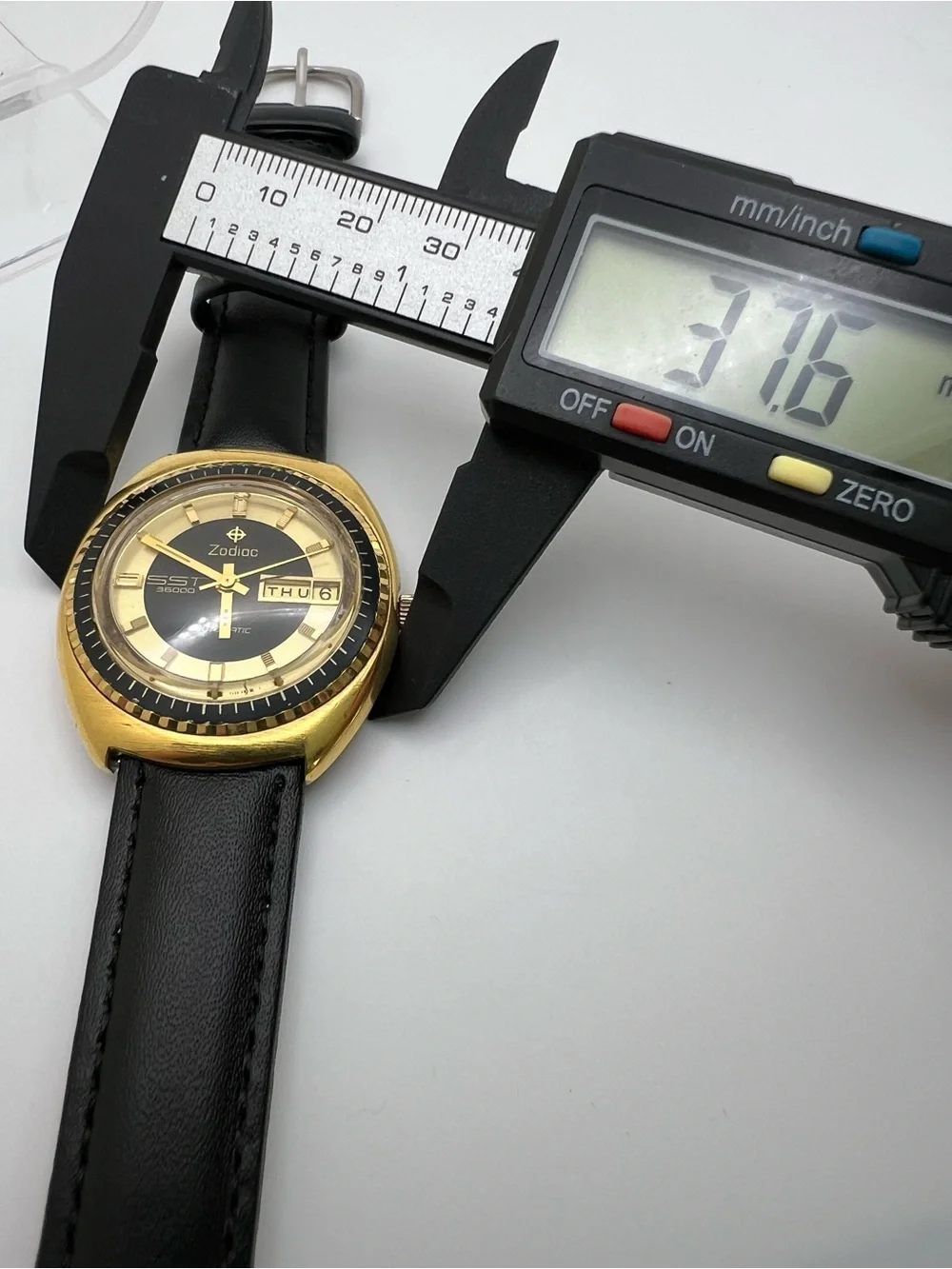 Zodiac Gold Tone Watch with Black Dial